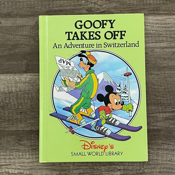 GOOFY TAKES OFF : AN ADVENTURE IN SWITZERLAND | DISNEY - HARDCOVER